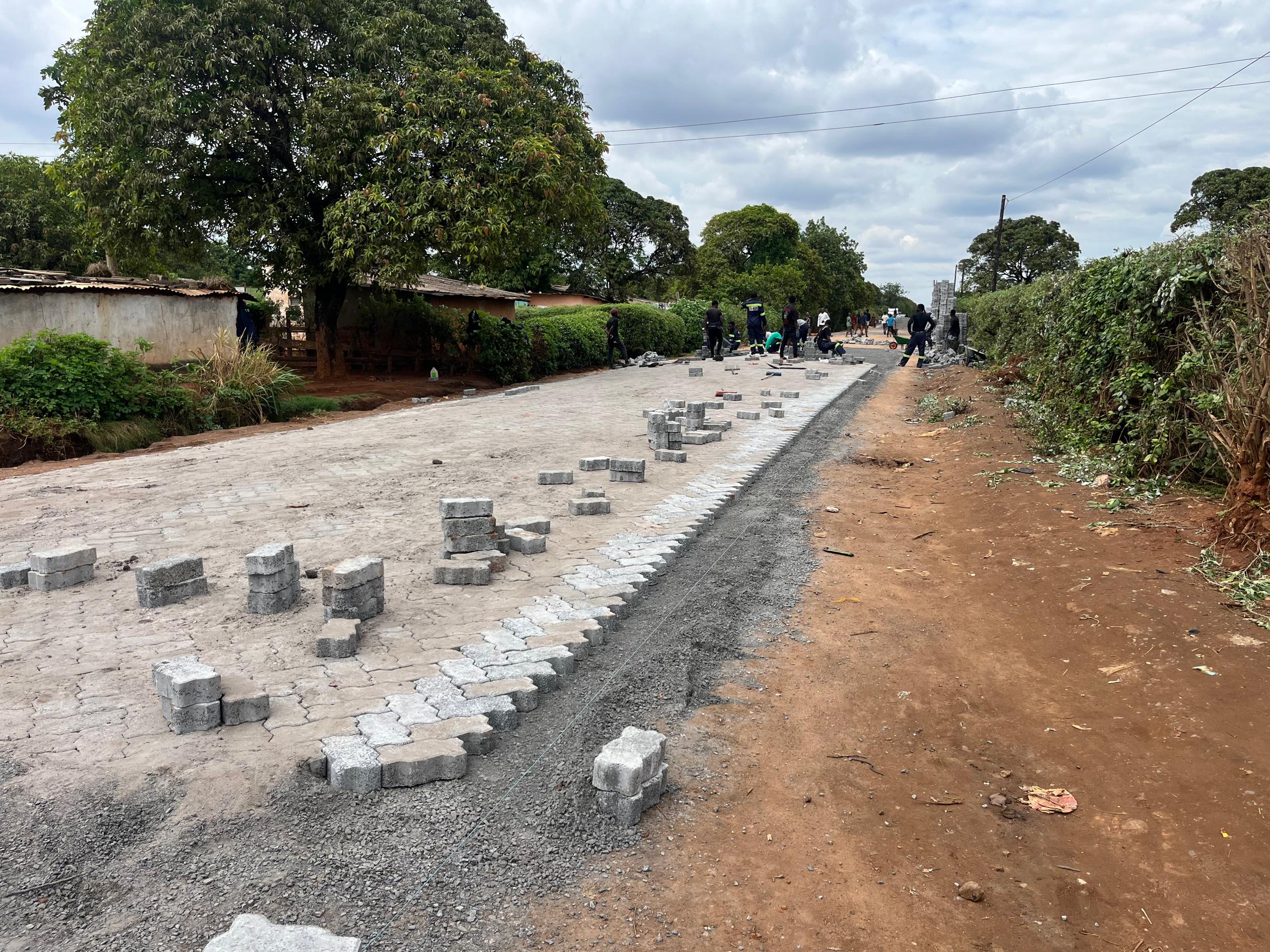 Compacting road surface